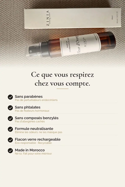 Flacon en verre 100ml du spray parfumant d'intérieur Zinia, inspiré de l'ambre traditionnel des maisons marocaines