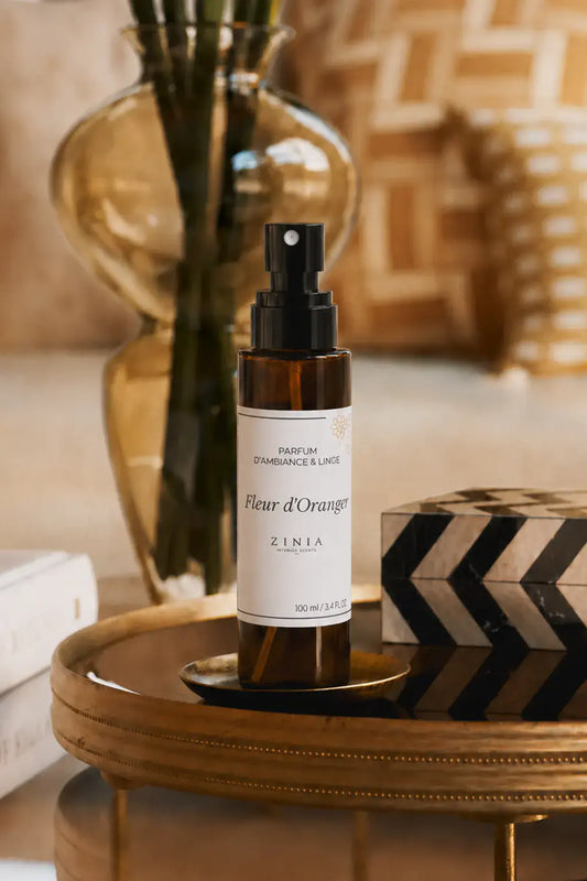 Flacon en verre 100ml du spray parfumant d'intérieur Zinia Néroli, inspiré de la fleur d'oranger distillée à Fès au Maroc
